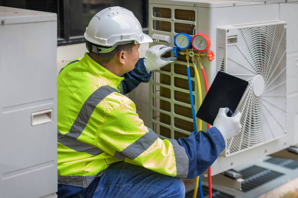 Professional Air Duct Cleaning technician working in Hebron, IL